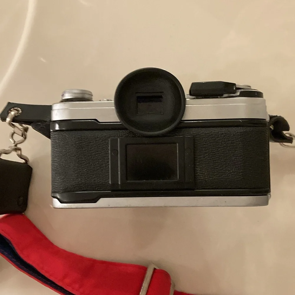 Vintage Canon Camera with additional lenses.